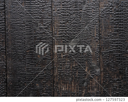 Burnt cedar board exterior wall Burnt cedar board exterior wall 127597323