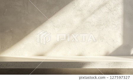 Concrete shelf with light and shadows on textured wall in warm natural sunlight, copy space Concrete shelf with light and shadows on textured wall in warm natural sunlight, copy space 127597327