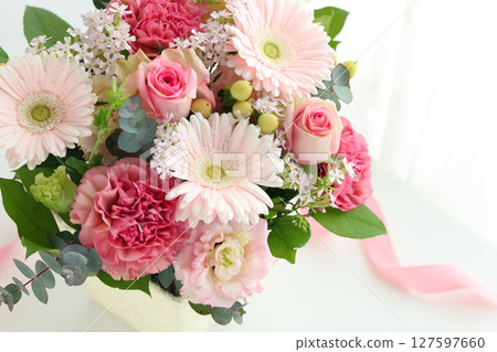 Gerbera and carnation arrangement 127597660
