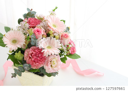 Gerbera and carnation arrangement 127597661