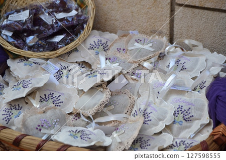 Aromatic lavender bags and crafts at Brihuega festival in Spain. Embroidered sachets with lavender Aromatic lavender bags and crafts at Brihuega festival in Spain. Embroidered sachets with lavender 127598555