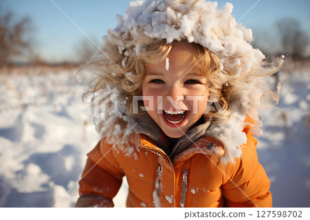 portrait of a child girl enjoying snow and winter portrait of a child girl enjoying snow and winter 127598702