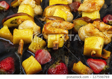 Chicken shashlik with pineapple. 127598769