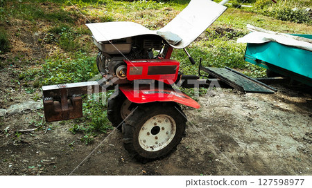 Red Garden Tiller Machine Outdoors 127598977
