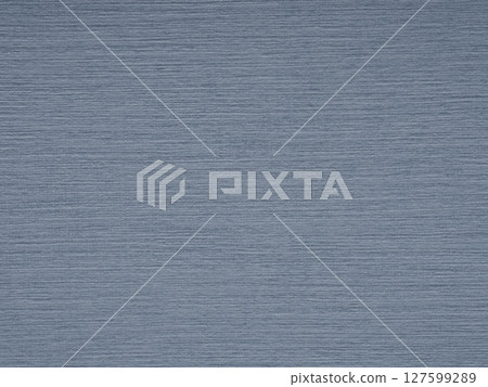 Strokes of denim blue on paper texture inspire thoughts of depth, reliability, and tranquil creativity Strokes of denim blue on paper texture inspire thoughts of depth, reliability, and tranquil creativity 127599289