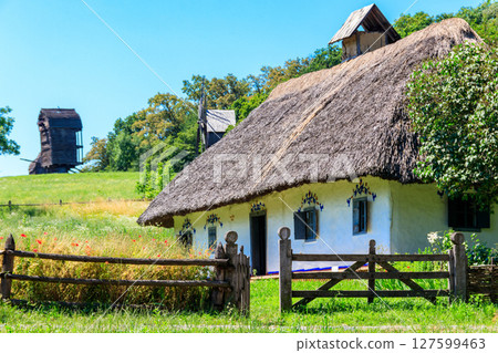 Ancient traditional ukrainian rural house in Pyrohiv (Pirogovo) village near Kiev, Ukraine Ancient traditional ukrainian rural house in Pyrohiv (Pirogovo) village near Kiev, Ukraine 127599463