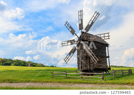 Old wooden windmill in Pyrohiv (Pirogovo) village near Kiev, Ukraine Old wooden windmill in Pyrohiv (Pirogovo) village near Kiev, Ukraine 127599465