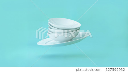 Plates in air on blue background 127599932