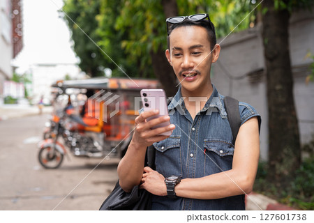 Nonbinary genderfluid young Thai gay man tourist in Thailand Nonbinary genderfluid young Thai gay man tourist in Thailand 127601738