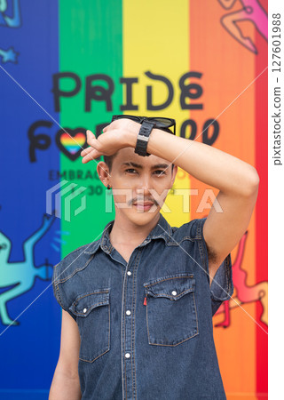 Portrait of confident non binary gay man during pride outdoors Portrait of confident non binary gay man during pride outdoors 127601988