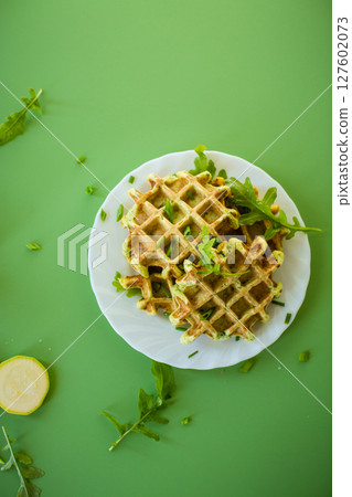 Healthy dish - zucchini and greens waffles Healthy dish - zucchini and greens waffles 127602073