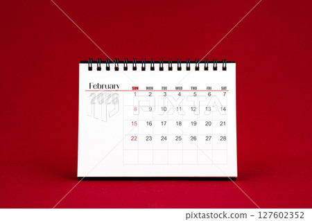 February 2026 Blank desk calendar on red color background. February 2026 Blank desk calendar on red color background. 127602352