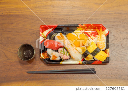 Dining alone: Sushi lined up on the table, Part 2 127602581