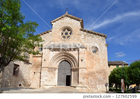Historic stone church in Brihuega, Spain with clear blue sky. Iglesia de San Felipe. Church Saint Felipe in Brihuega, Guadalajara, Spain 127602599