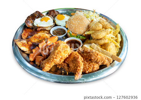 Top view of fried egg burger mix steak and sausage with sauce, focus selective 127602936