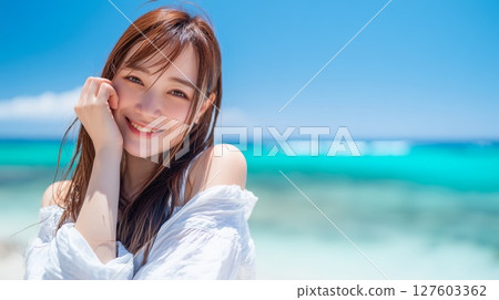 Portrait of a beautiful woman with sea background Portrait of a beautiful woman with sea background 127603362
