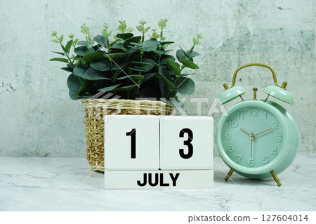 Wooden Calendar Showing the Date of July 13th. Day 13 of July month 127604014