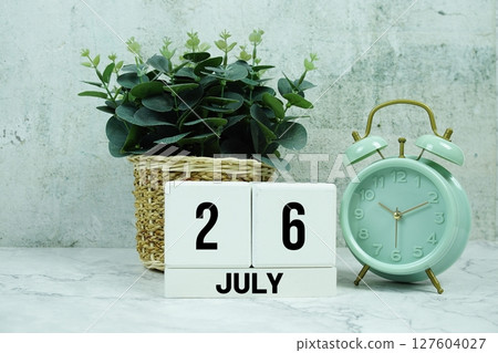 Wooden Calendar Showing the Date of July 26th. Day 26 of July month Wooden Calendar Showing the Date of July 26th. Day 26 of July month 127604027