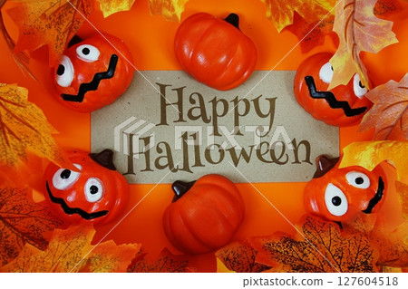 Happy Halloween text with element decorations on orange background 127604518