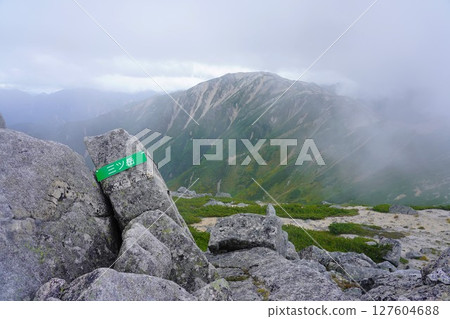 The summit sign of Mt. Mitsudake and Mt. Noguchi Goro The summit sign of Mt. Mitsudake and Mt. Noguchi Goro 127604688