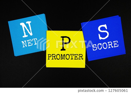 NPS - Net Promoter Score acronym text on sticky note on black background NPS - Net Promoter Score acronym text on sticky note on black background 127605061