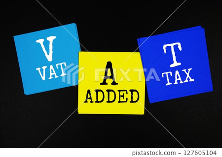 VAT - Value Added Tax acronym text on sticky note on black background VAT - Value Added Tax acronym text on sticky note on black background 127605104