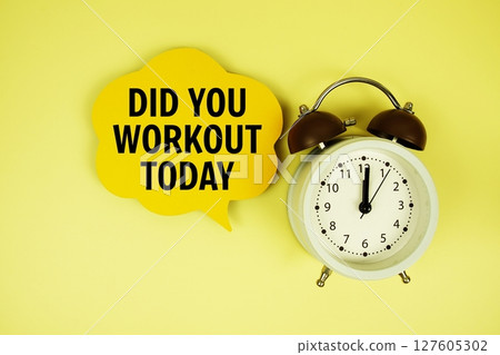Did You Workout Today text on speech bubble with alarm clock on yellow background Did You Workout Today text on speech bubble with alarm clock on yellow background 127605302
