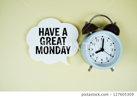 Have A Great Monday text on speech bubble with alarm clock on yellow background 127605309