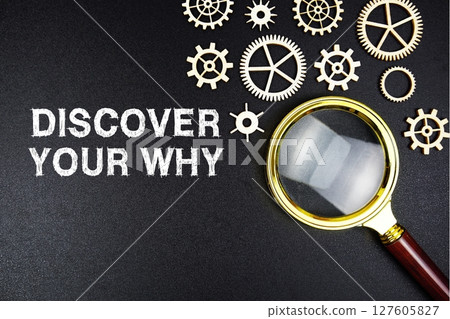 Discover Your Why text message with magnifying glass on black background 127605827
