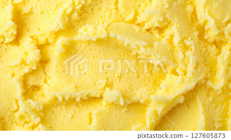 Yellow sherbet closeup texture background 127605873