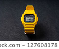 Yellow digital watch 127608178