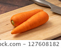 Fresh carrots on a cutting board 127608182