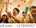 A party scene full of young people's smiles A party scene full of young people's smiles 127609267