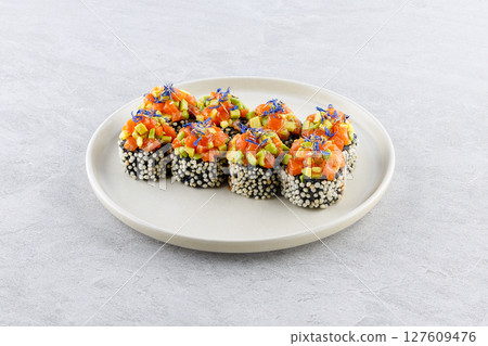 Elegant Crunchy Puffed Rice Sushi Rolls Topped with Salmon Avocado 127609476