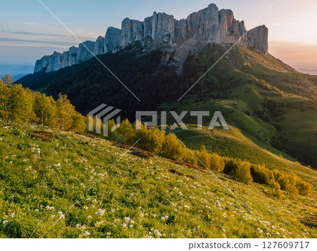 Panoramic view of Bolshoy Tkhach mount in Caucasus with sunset or sunrise Panoramic view of Bolshoy Tkhach mount in Caucasus with sunset or sunrise 127609717