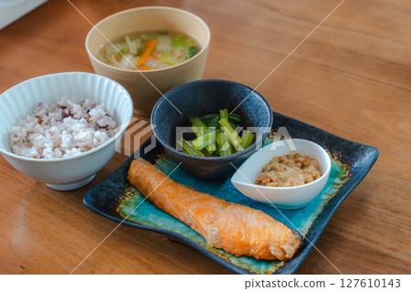 Grilled salmon and natto Japanese breakfast set Grilled salmon and natto Japanese breakfast set 127610143