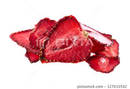 Dried strawberry slices isolated on white background. Dehydrated strawberries chips. Clipping path. Dried strawberry slices isolated on white background. Dehydrated strawberries chips. Clipping path. 127610582