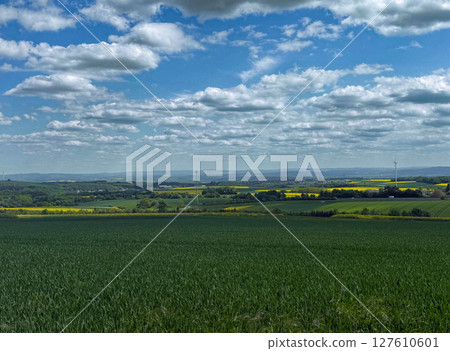 Beautiful view from the hills to a small village. Warm and sunny day 127610601