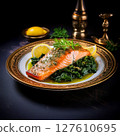 Cod and Salmon fillet with rice and spinach garnish. Lemon salmon on white plate on wooden 127610695