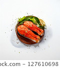 Grilled Salmon Steak with Spinach, Tartare Cream and Lemon Wedges 127610698