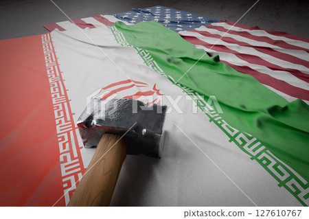 Large Hammer Resting on American And Iranian Flags. Large Hammer Resting on American And Iranian Flags. 127610767