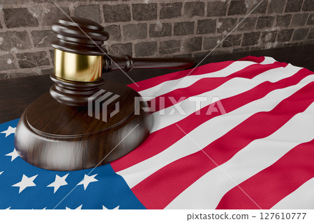 American Flag and Wooden Gavel Resting on Desk. American Flag and Wooden Gavel Resting on Desk. 127610777