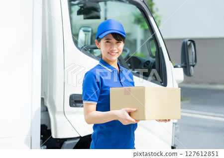 Young woman driver Young woman driver 127612851