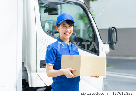 Young woman driver Young woman driver 127612852