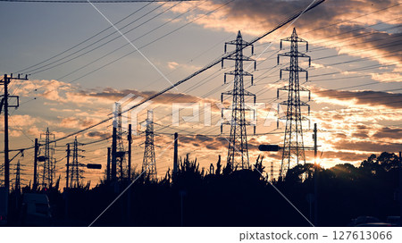 Sunset sky and power transmission towers Sunset sky and power transmission towers 127613066
