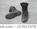 Worn jungle boots 127613378