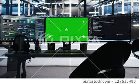 Visual programming systems on green screen PC in data center tracking infrastructure performance. Chroma key displays in server hub displaying node tree programming detecting equipment issues Visual programming systems on green screen PC in data center tracking infrastructure performance. Chroma key displays in server hub displaying node tree programming detecting equipment issues 127613496