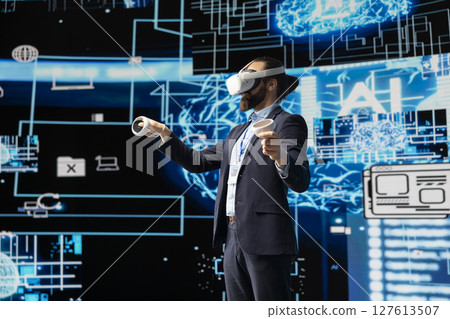 Business IT expert employs vr glasses and artificial intelligence brain, working on data visualization cybernetics within a futuristic interface for machine learning. High tech gadget for innovation. 127613507