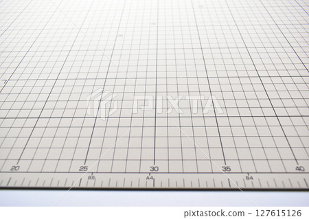 gray cutting mat board background with line and scale measure guide pattern for object art design gray cutting mat board background with line and scale measure guide pattern for object art design 127615126