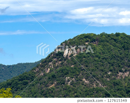 Fire warning signs written on a rocky mountain (Joyama) in Gohara-cho, Kure City, Hiroshima Prefecture Fire warning signs written on a rocky mountain (Joyama) in Gohara-cho, Kure City, Hiroshima Prefecture 127615349